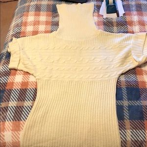 Short sleeve fold-over turtleneck sweater.